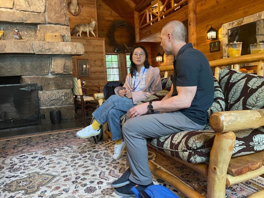 CSST Summer Institute Builds Community Across Disciplines – iSchool Man and woman speaking