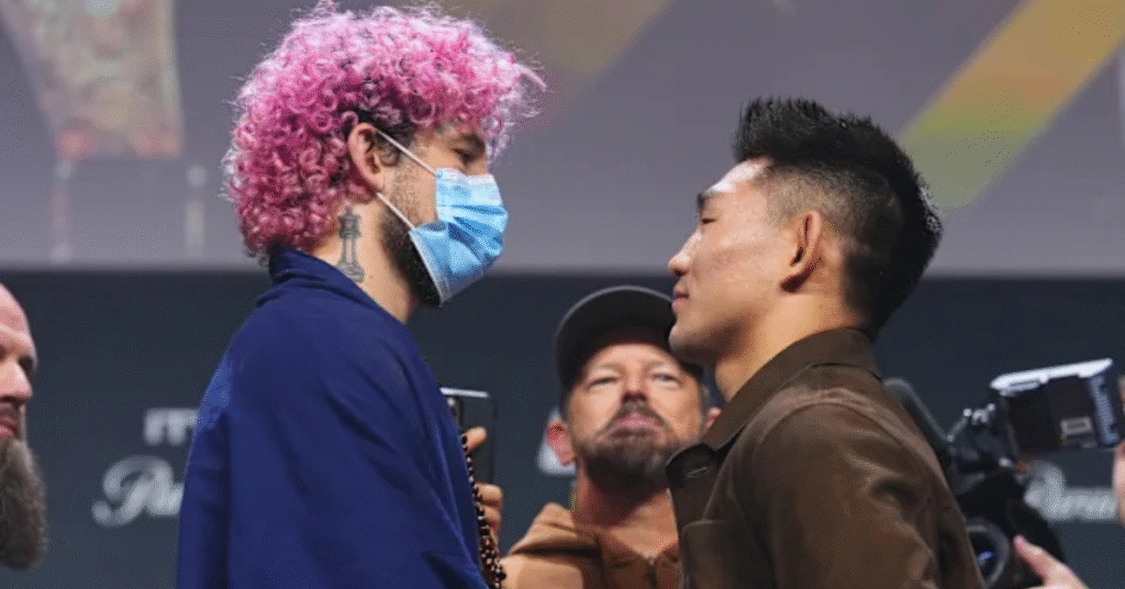 China's Song Yadong Reacts to Sean O'Malley's COVID Mask During Faceoff