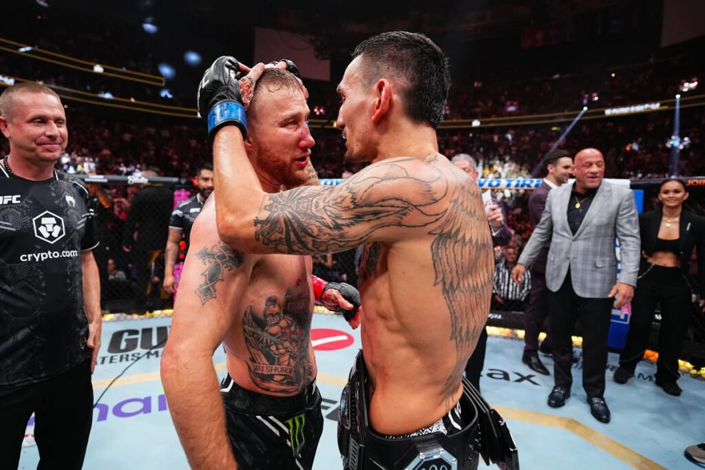 Max Holloway embraces Justin Gaethje at UFC 300