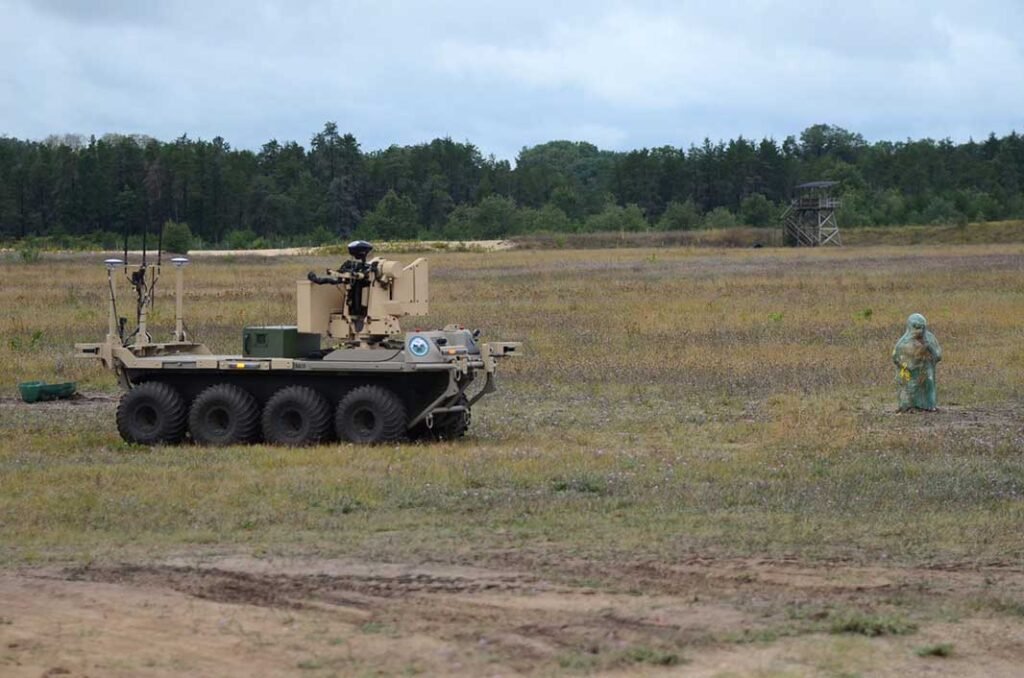 An unmanned ground vehicle (UGV), part of the Autonomous Last Mile suite of ground vehicles, undergoing testing at Camp Grayling, Michigan, on 28 August 2019. [US Army]