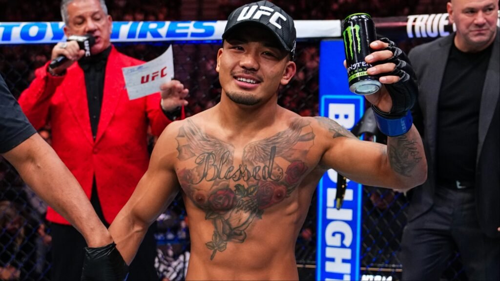 Top flyweight accuses UFC of ‘protecting’ Joshua Van from division’s toughest challengers Joshua Van celebrates as the official decision is read at UFC 323