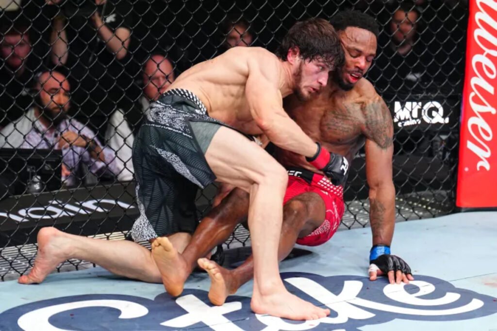 Lerone Murphy taken down by Movsar Evloev at UFC London