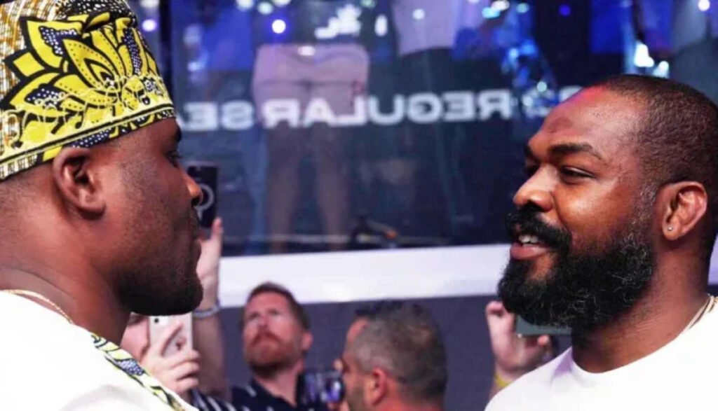 Francis Ngannou intrigued by Jon Jones’ presence on Rousey vs. Carano broadcast: “It’s very interesting” Francis Ngannou and Jon Jones face off
