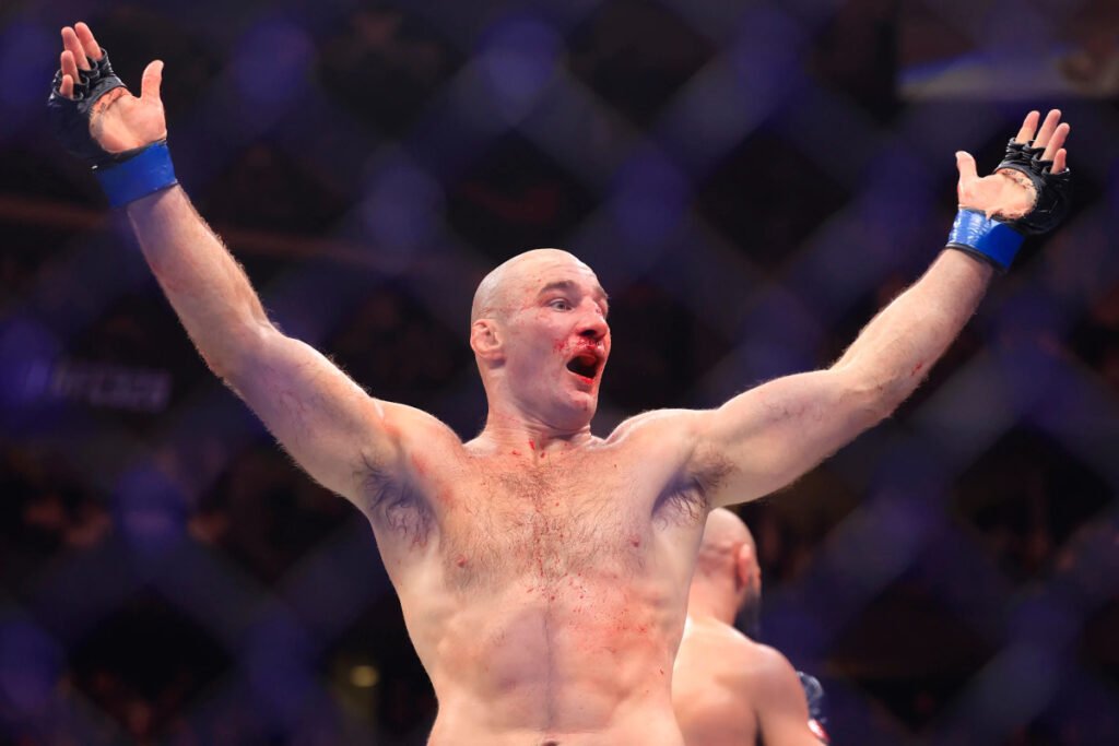Sean Strickland could’ve been more dominant against Khamzat Chimaev, says Daniel Cormier: “He really could’ve made Khamzat struggle” Sean Strickland raises his arms after UFC 328 fight with Khamzat Chimaev