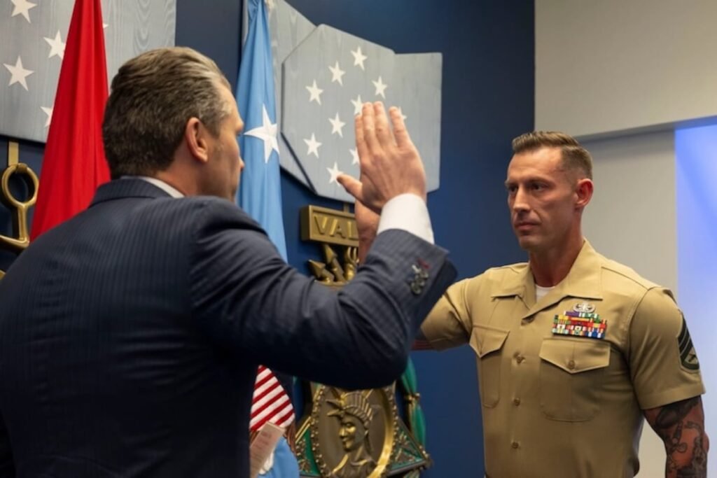 Veteran who lost both of his legs in combat reenlists in the Marine Corps Veteran who lost both of his legs in combat reenlists in the Marine Corps