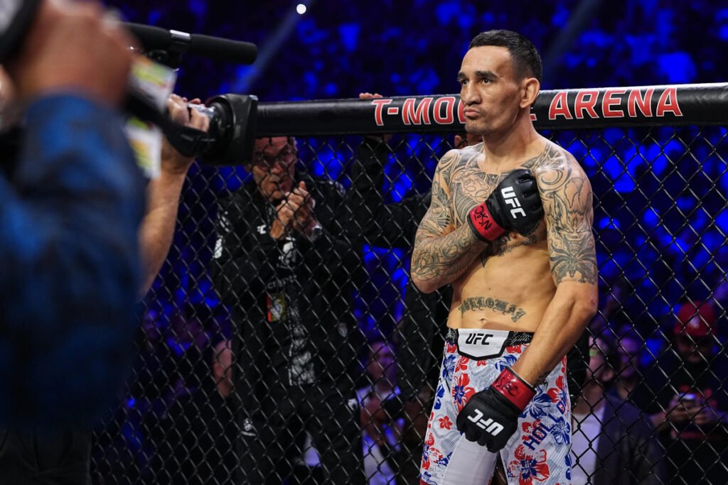 Max Holloway gets introduced before a UFC fight inside T-Mobile Arena in Las Vegas