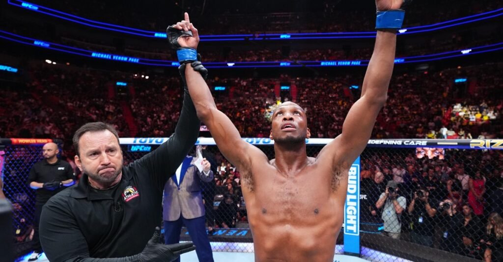 Michael Page wrestles Alexander Shlemenko in debut at RAF 14 Michael Page wrestles Alexander Shlemenko in debut at RAF 14