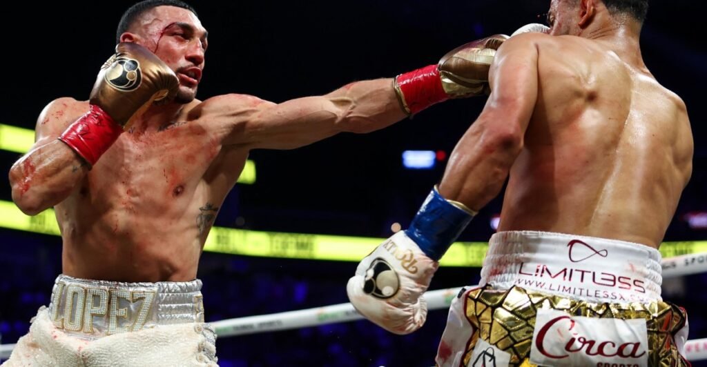 Teofimo Lopez edges Rolly Romero with majority decision to become 3-weight world champion Teofimo Lopez edges Rolly Romero with majority decision to become 3-weight world champion