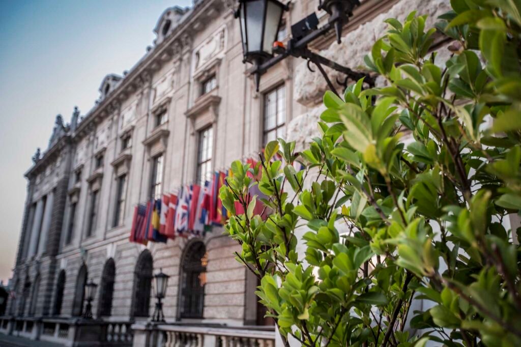 The OSCE – Reform or Irrelevance? The Hofburg in Vienna, home to the OSCE Permanent Council. In total the OSCE has 57 participating states, as confirmed by the flags outside the Hofburg. (Image: OSCE)