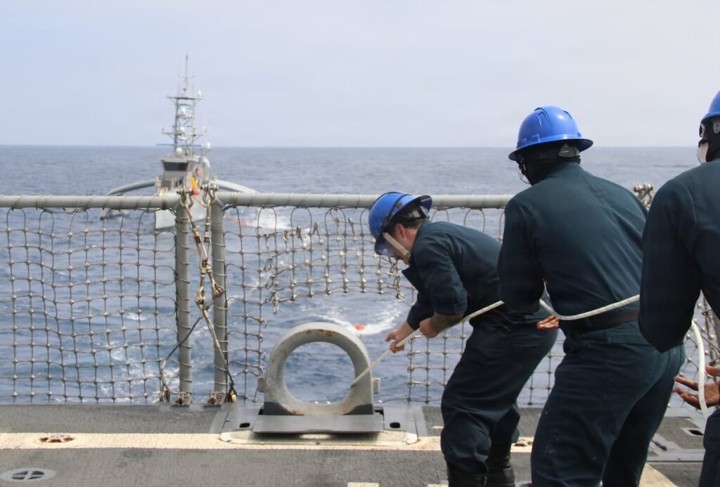 US destroyer practices at-sea drone refueling US destroyer practices at-sea drone refueling